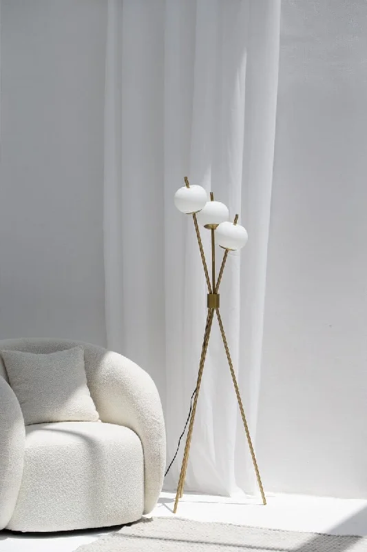 Fabric Floor Lamp with a Linen Shade for a Relaxed AestheticGold Floor Lamp with Three Spherical White Heads